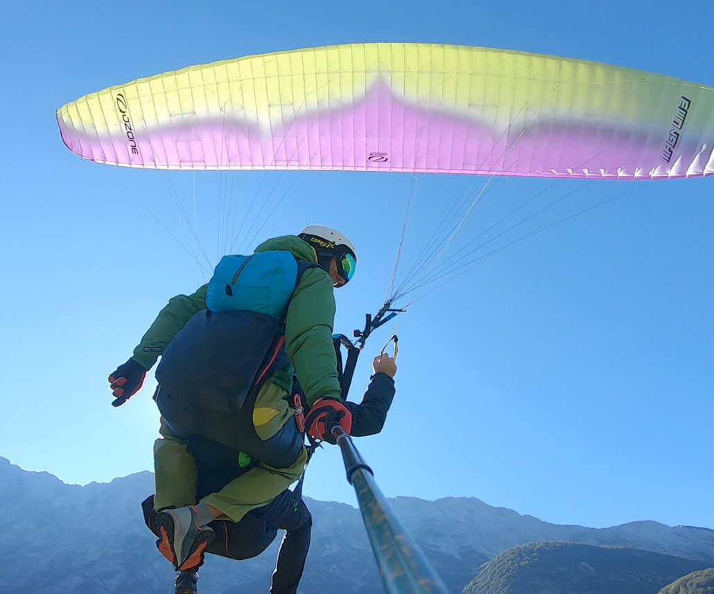 Tandem Paragliding above Soča river.