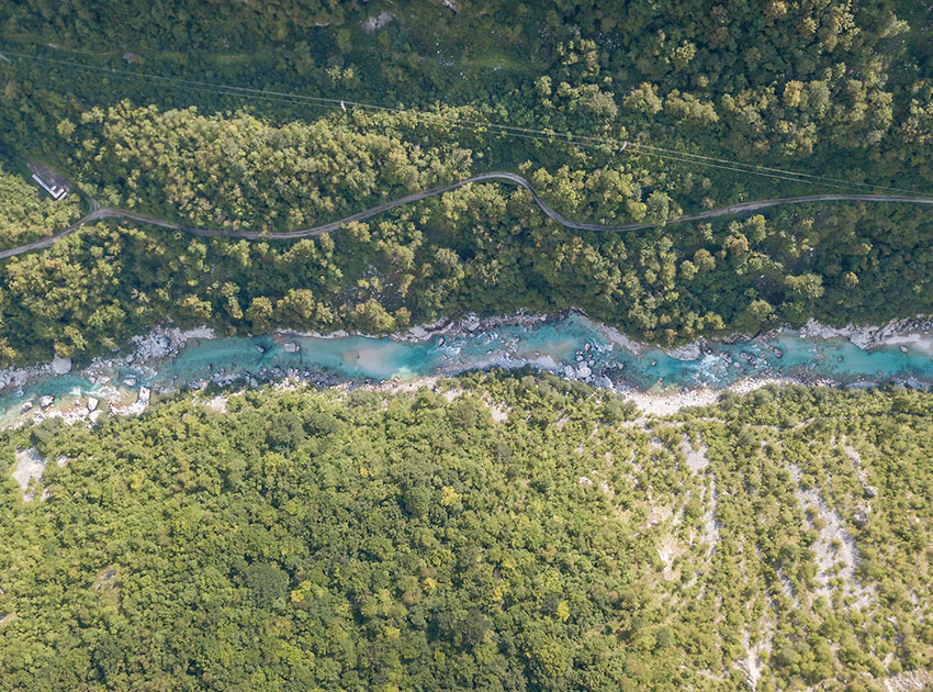 soča river from the air looks like an emerald vein